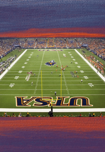 a football field with the word ucla on the field