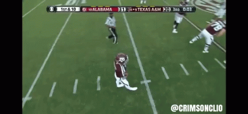 A Football Game Between Alabama And Texas A&m Is Being Played GIF