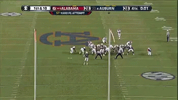 A Football Game Between Auburn And Alabama Is Being Played GIF