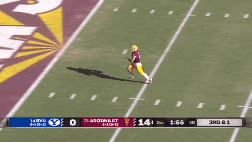 a football game between byu and arizona st.