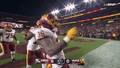 A Football Game Between Den And Was Is Being Broadcast On Snf GIF