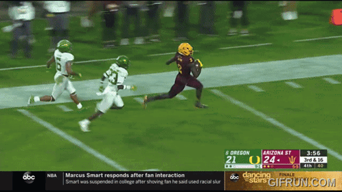 A Football Game Between Oregon And Arizona Is Being Played GIF