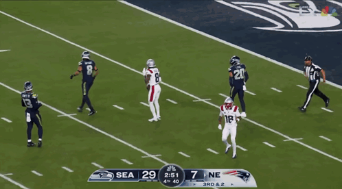 A Football Game Between Seahawks And Patriots GIF