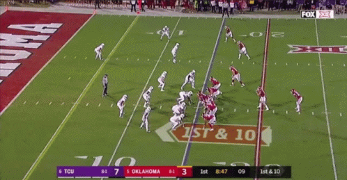 A Football Game Between Tcu And Oklahoma Is Being Shown On Fox GIF