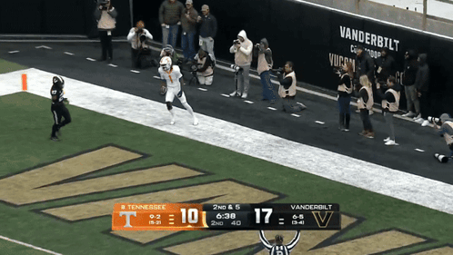 A Football Game Between Tennessee And Vanderbilt With A Score Of 17 To 17 GIF