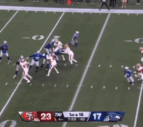 a football game between the 49ers and the seahawks