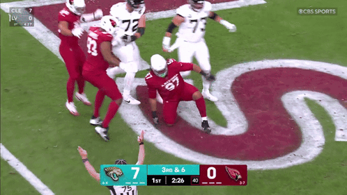 A Football Game Between The Cardinals And The Jaguars Is Being Shown On Cbs Sports GIF