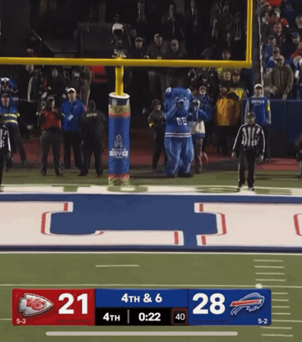 a football game between the chiefs and the bills with a score of 28 to 21