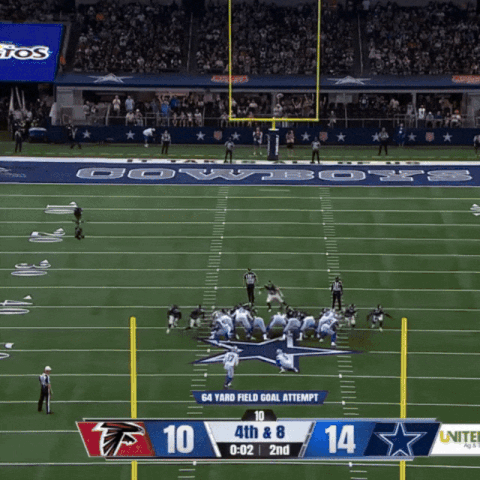 a football game between the cowboys and falcons