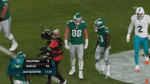 a football game between the dolphins and eagles is being played