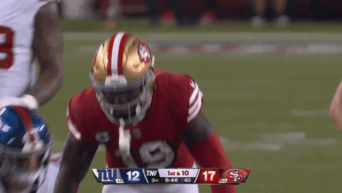 A Football Game Between The Giants And 49Ers GIF