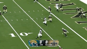 A Football Game Between The Jaguars And The Saints Is Being Played GIF