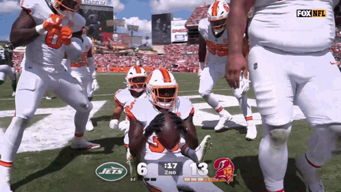 A Football Game Between The Jets And The Buccaneers Is Being Shown On Fox Nfl GIF
