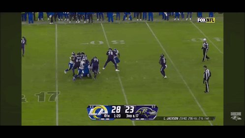 A Football Game Between The Rams And The Ravens GIF