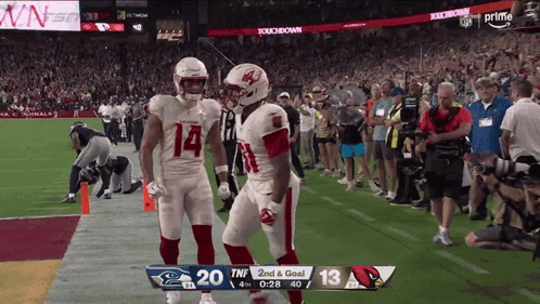 A Football Game Is Being Played And The Score Is 20-13 GIF