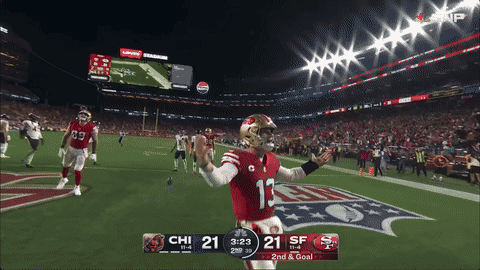 a football game is being played and the score is 21 to 21