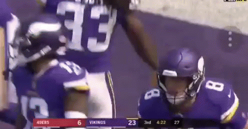 A Football Game Is Being Played Between The 49Ers And Vikings GIF