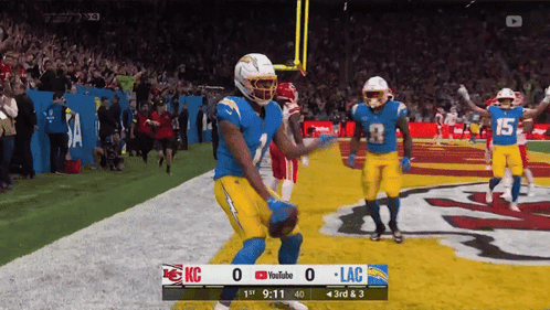 a football game is being played between the lac and the kc