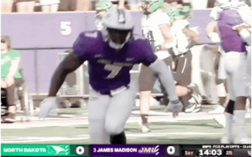 A Football Game Is Being Played Between The North Dakota And The Miami Dolphins GIF