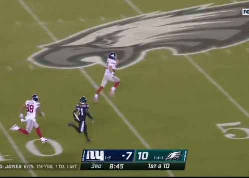 A Football Game Is Being Played Between The Ny Giants And The Eagles GIF