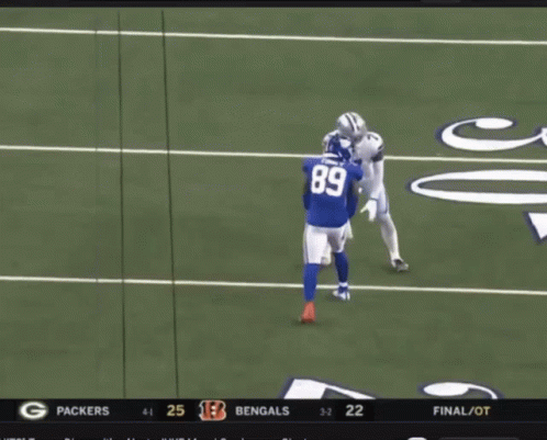 A Football Game Is Being Played Between The Packers And Bengals GIF