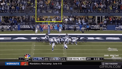 A Football Game Is Being Played Between The Seahawks And The Dals GIF