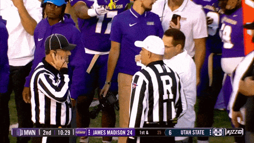 A Football Game Is Being Played Between The Utah State And James Madison GIF