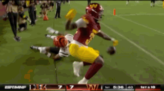 A Football Game Is Being Played Between The Washington Redskins And The Washington Nationals GIF