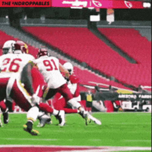 A Football Game Is Being Played In An Empty Stadium GIF