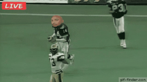 A Football Game Is Being Played Live And The Referee Has The Number 53 On His Back GIF
