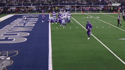 A Football Game Is Being Played On A Field That Says Cowboys On It GIF
