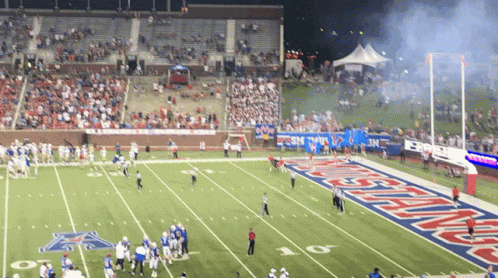 a football game is being played on a field that says texas tech on it