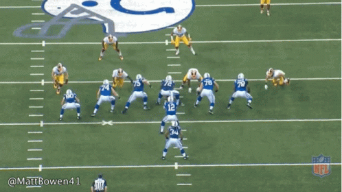 A Football Game Is Being Played On A Field With The Letter C On It GIF