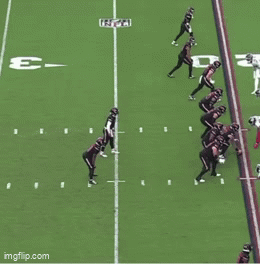 A Football Game Is Being Played On A Field With The Letter E In The Middle GIF