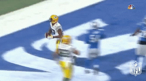 A Football Game Is Being Played On A Field With The Nfl Logo GIF