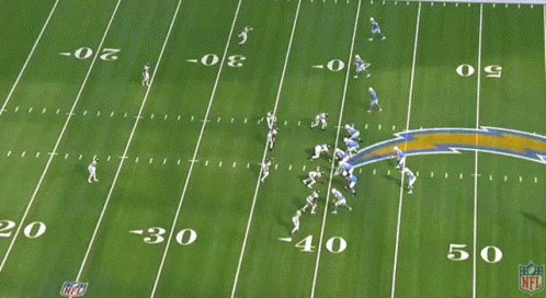 A Football Game Is Being Played On A Field With The Number 30 On It GIF