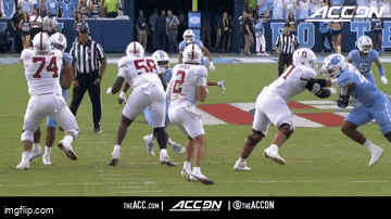 a football game is being played with the accon logo in the corner