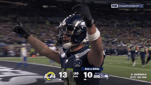 a football player celebrates a touchdown during a fox championship game