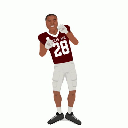 A Football Player From Texas A & M Stands In Front Of Fireworks GIF