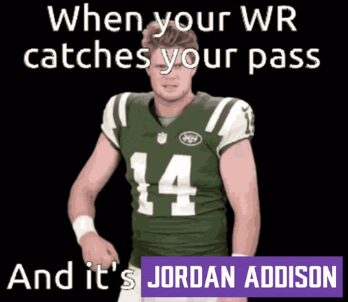 a football player in a green jersey with the number 14