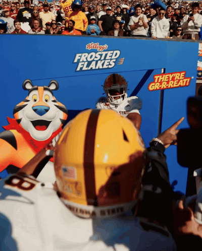 a football player in a kellogg 's frosted flakes uniform