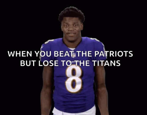 a football player in a purple jersey with the number 8