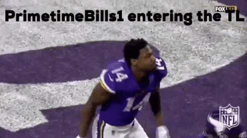 A Football Player In A Purple Uniform Is Jumping In The Air . GIF