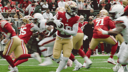 A Football Player In A Red Uniform With The Number 10 On It GIF