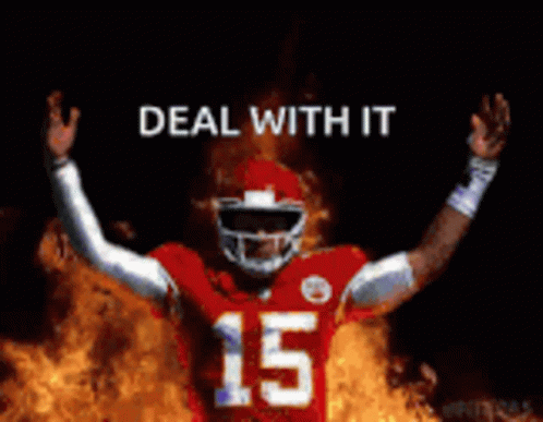 A Football Player In A Red Uniform With The Number 15 On It GIF