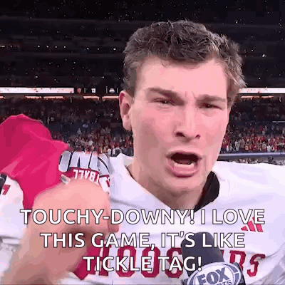 A Football Player Is Giving A Tickle Tag During A Game GIF