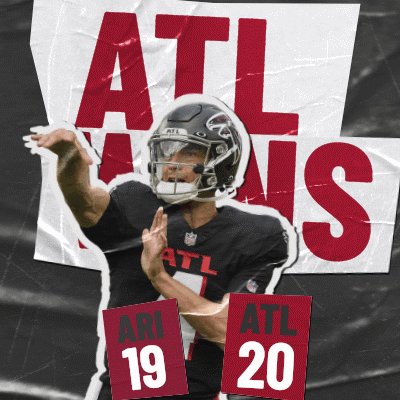 A Football Player Is Holding Up A Sign That Says Atl 20 GIF
