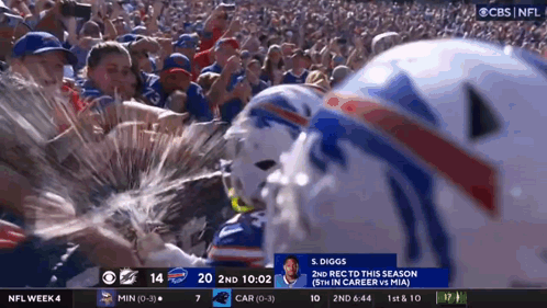 A Football Player Named S. Diggs Is Being Sprayed With Water GIF