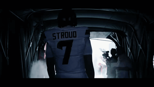 A Football Player Named Stroud Is Walking Through A Dark Tunnel GIF