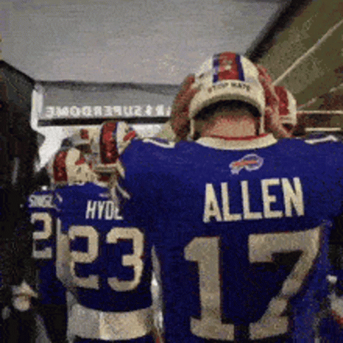 A Football Player Wearing A Blue Jersey That Says Allen 17 GIF
